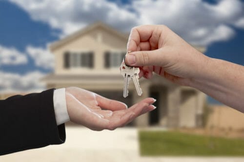 Handing Over the House Keys in Front of a Beautiful New Home. business dissolution coral springs, business dissolution coral springs fl, business dissolution parkland, business dissolution parkland fl, business formation parkland, business litigation parkland fl, arbitration parkland, business litigation coral springs, business litigation parkland, sued in coral springs, sued in parkland, arbitration coral springs, business attorney parkland, business formation parkland fl, business law attorney parkland, business law attorney parkland fl, business litigation coral springs fl, business attorney coral springs, arbitration parkland fl, business law attorney coral springs, intellectual property law parkland, lawyer contract parkland, lawyer contract coral springs, mediation parkland, mediation parkland fl, business formation coral springs, business formation coral springs fl, llp parkland, real estate attorney coral springs, real estate attorney coral springs fl, business sued parkland, business sued coral springs, sue my landlord, sue hoa, sue contractor, sue employee, someone owes me money